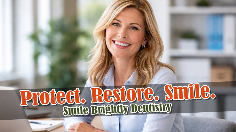 Professional woman smiling at work after dental crown or bridge treatment in Warren, MI